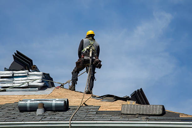 Professional Gutter Installation technician working in West Sayville, NY